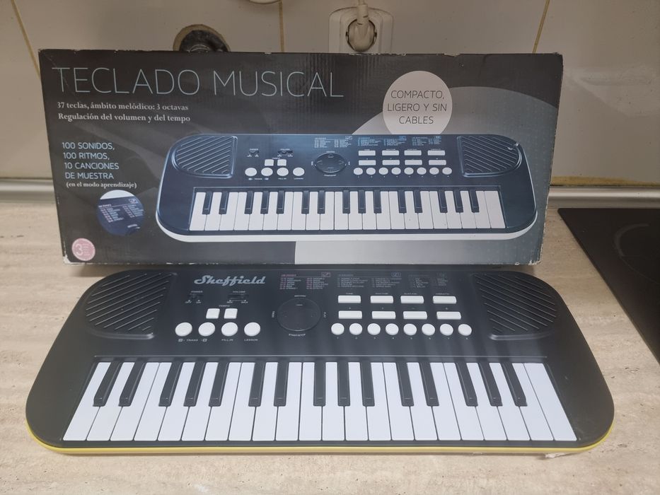 Teclado musical portátil