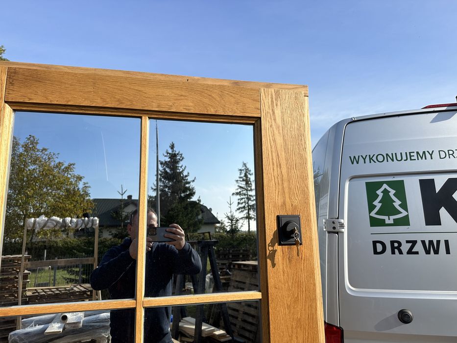 Drzwi zewnętrzne drewniane z klamką Schlage na wymiar Czyste powietrze