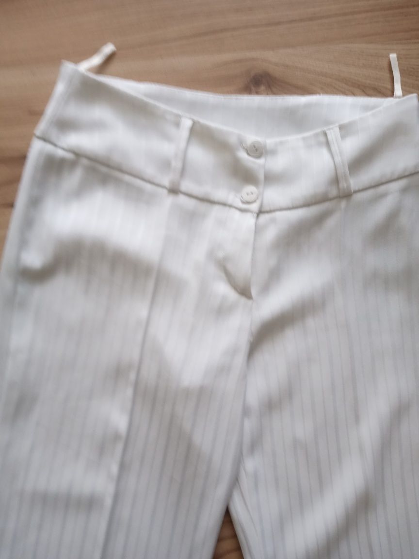 Białe eleganckie spodnie z szerokimi nogawkami, rozmiar 36