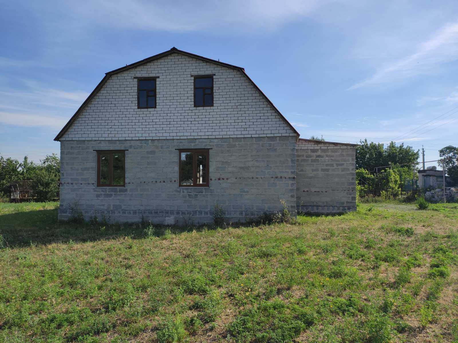 Продам ділянку з новобудовою