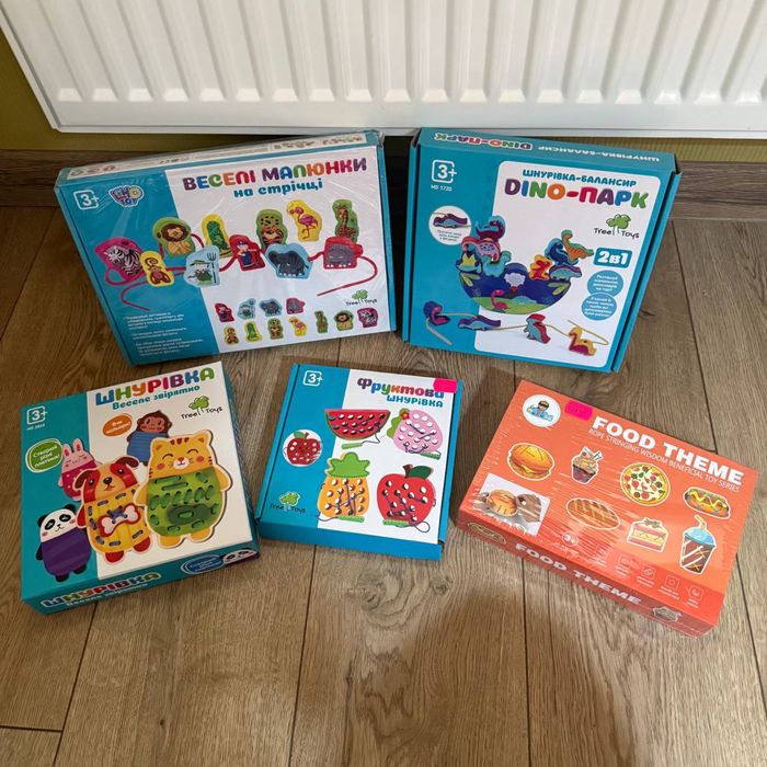 Дитічі іграшки-шнурівки