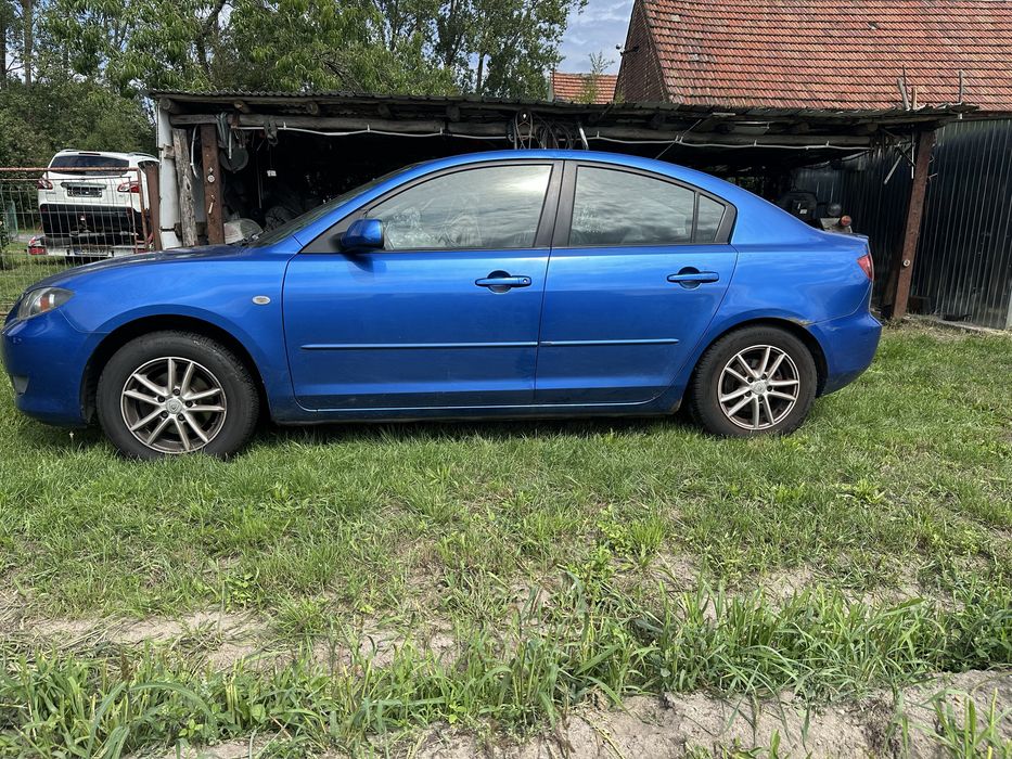 Mazda 3-/ мотор 1.6 бензин/ капот / з Німеччини / фара