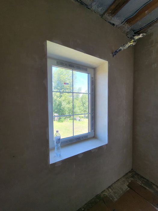 Штукатурка будинків. Машинна штукатурка