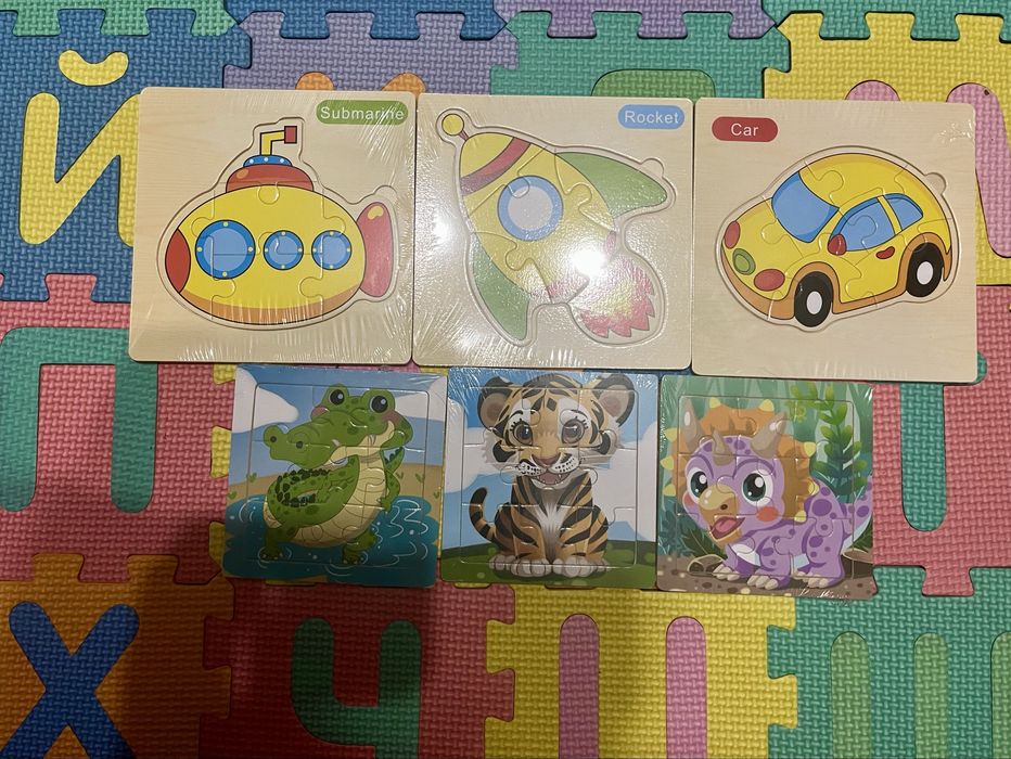 Нові іграшки для дітей: пазли, доміно та ігровий манеж