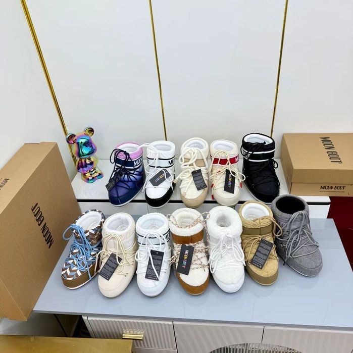 Чоботи, снігоходи, мунбути Moon Boot