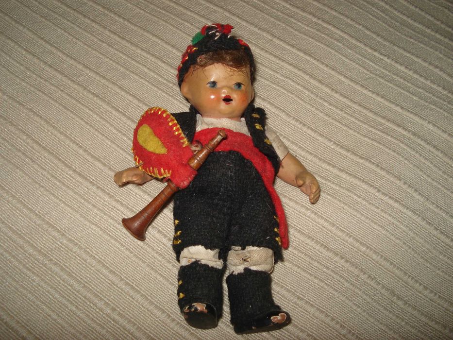 Boneco antigo ,tocador de gaita de foles