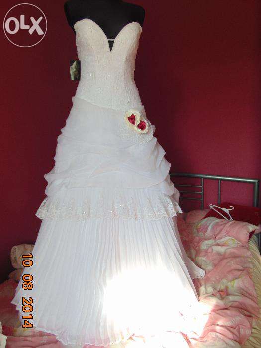 super nowiutka suknia ślubna