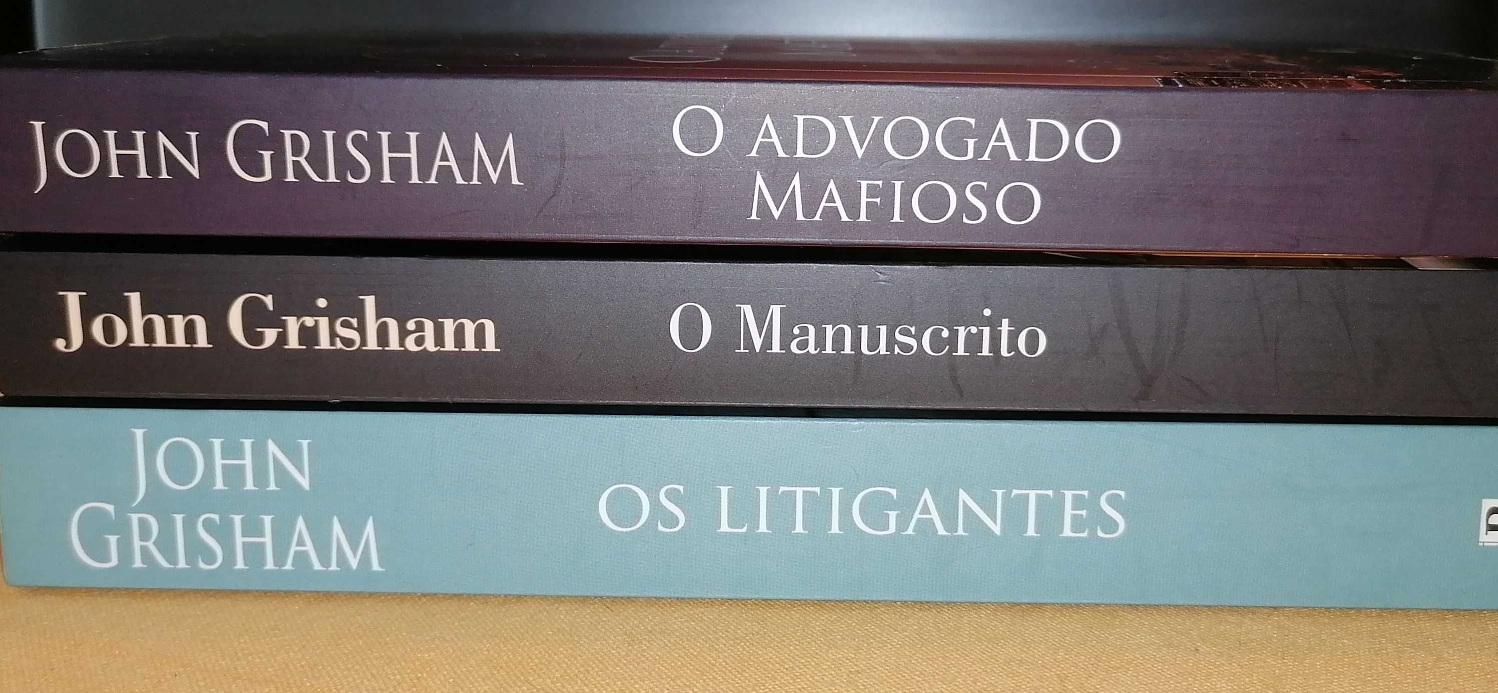 Livros de John Grisham, como novos e sem danos.