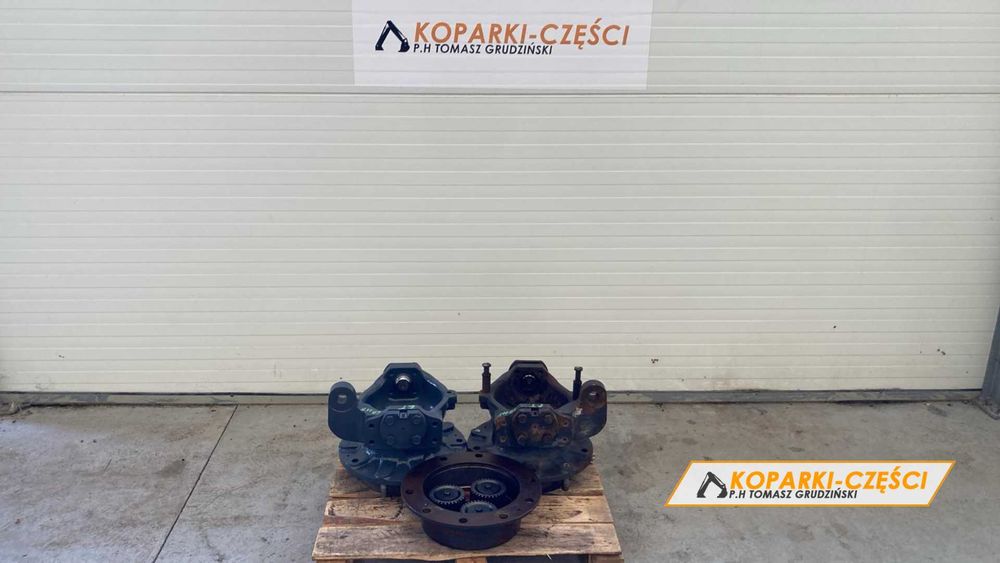 Zwolnica kompletna tylna New Holland LB 115, CASE 695, Hitachi FB 200
