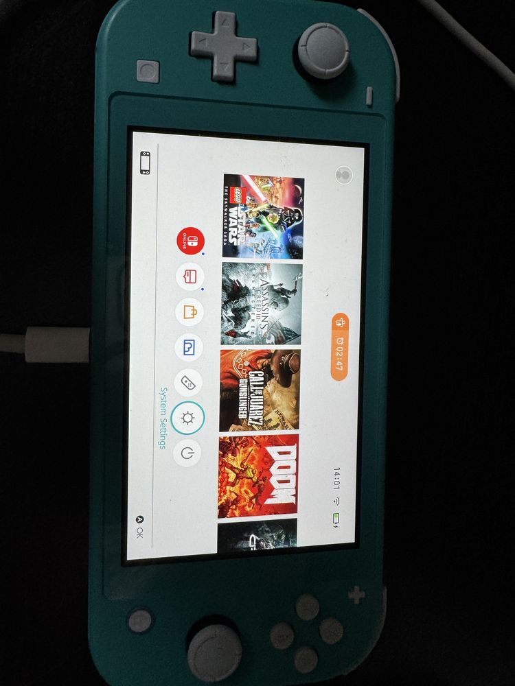 Nintendo Switch Lite Green + pokrowiec