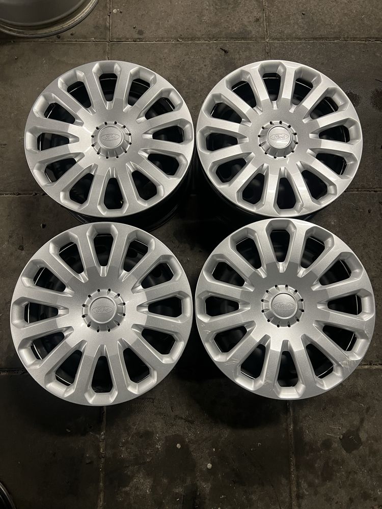 Felgi stalowe z kołpakami 6Jx15H2 ET47.5 4x108 Ford Fiesta Fusion KA