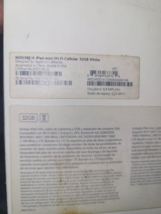 IPad mini з коробкою та документами