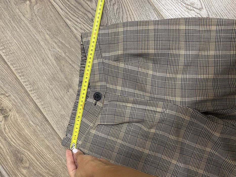 Костюм брючний в клітинку