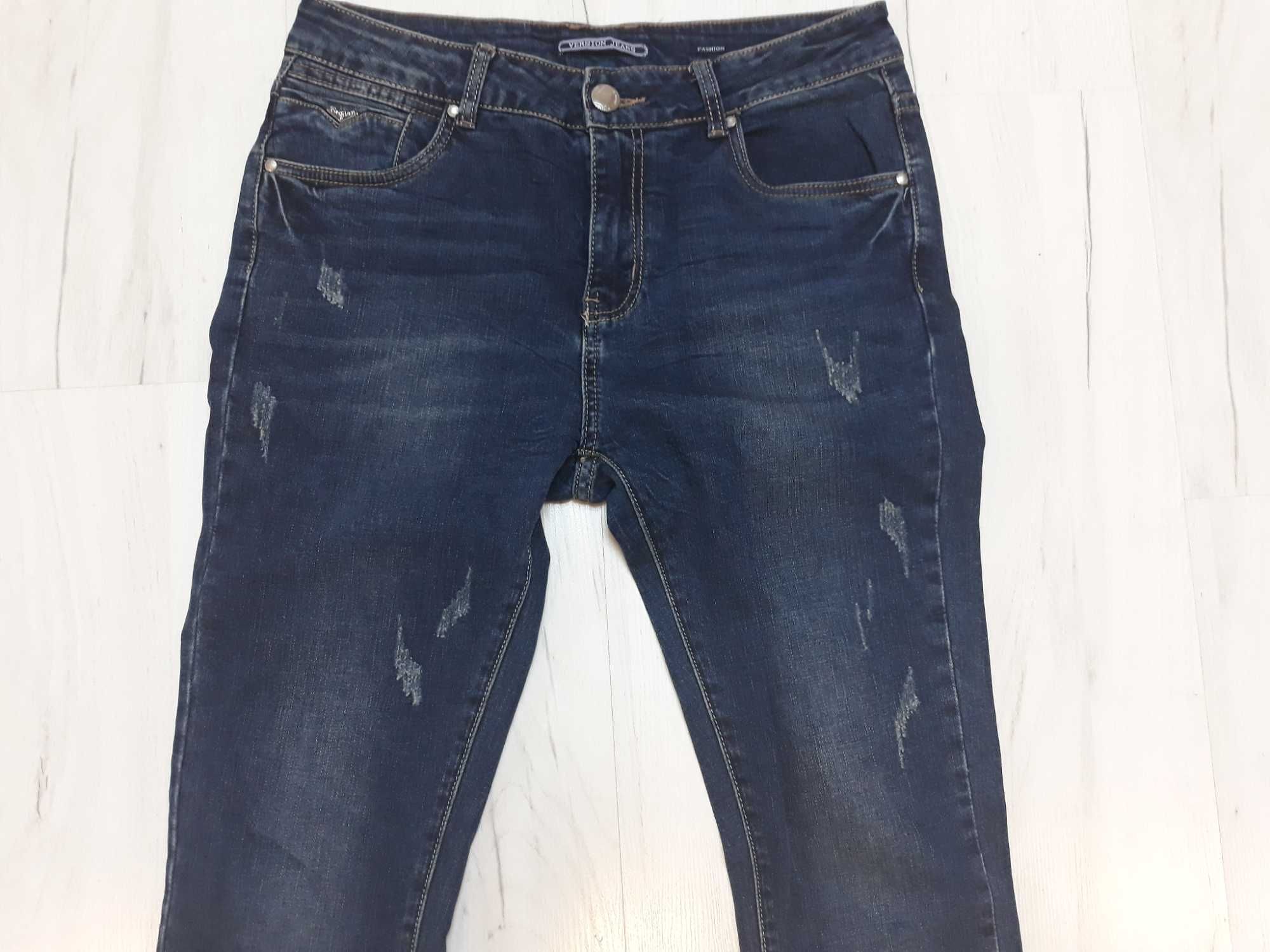 spodnie jeans z przetarciami  r.28