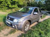 Suzuki Grand Vitara Suzuki Grand Vitara 1.6 Benzyna 4x4 – Kompaktowy SUV z Charakterem!