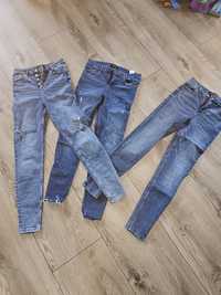 Cztery pary jeansów Mohito z przetarciami