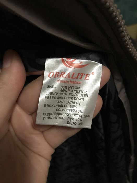 Зимовий теплий якісний новий пуховик пальто S-M коричневе з поясом