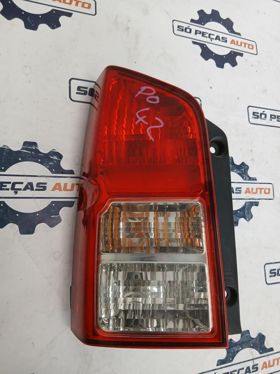 FAROLIM ESQUERDO CINZENTO NISSAN PATHFINDER SPORT DCI ANO: 2008