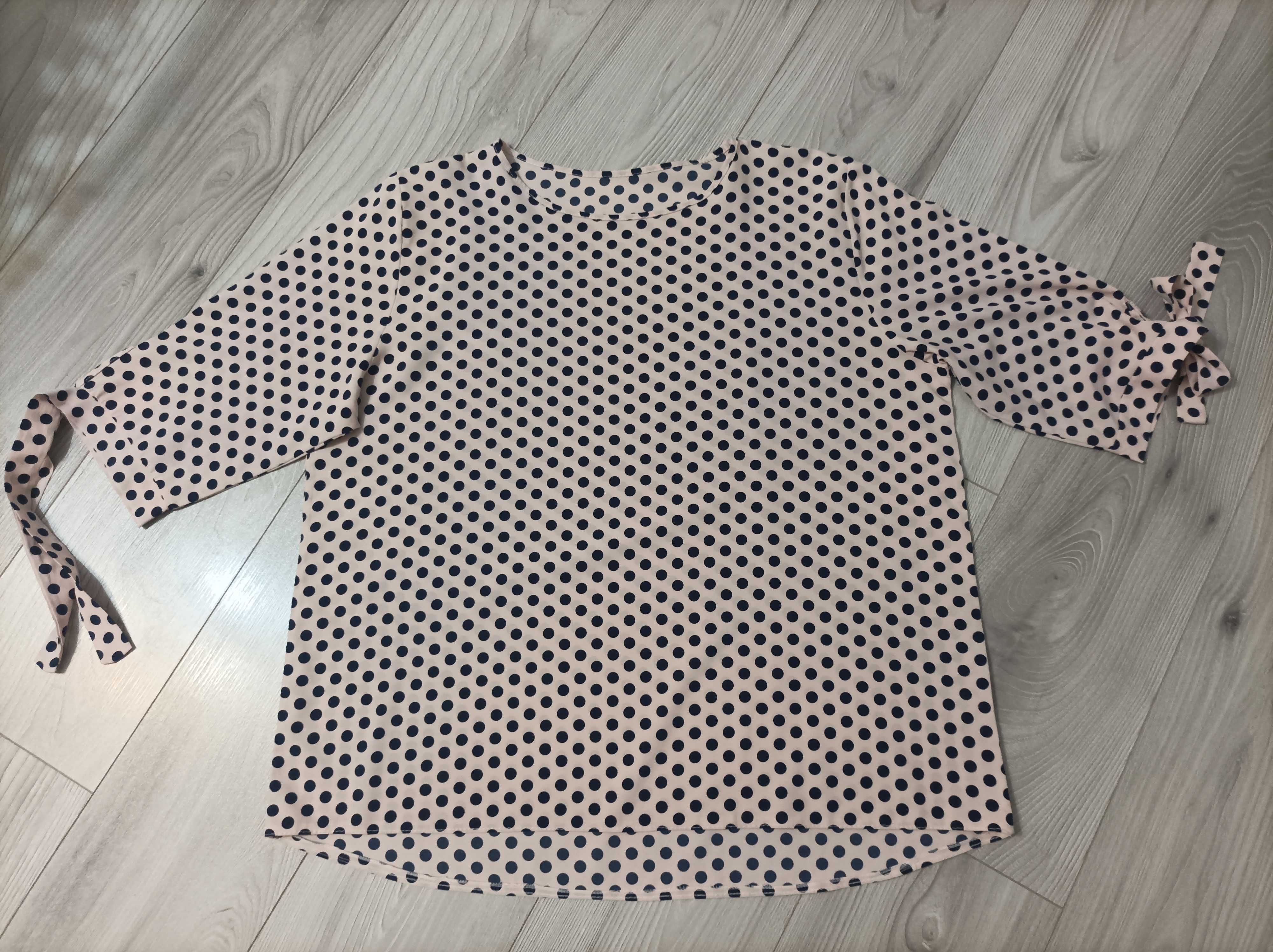 Elegancka bluzka z rękawem 3/4 w rozmiarze 46