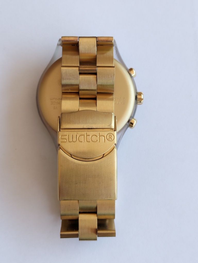 Vendo relógio dourado Swatch