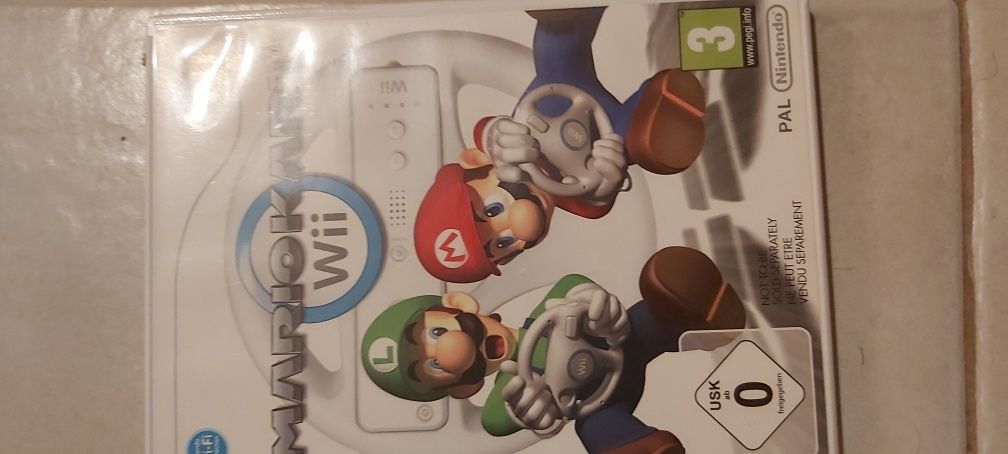 Nintendo Wii com comandos e jogos