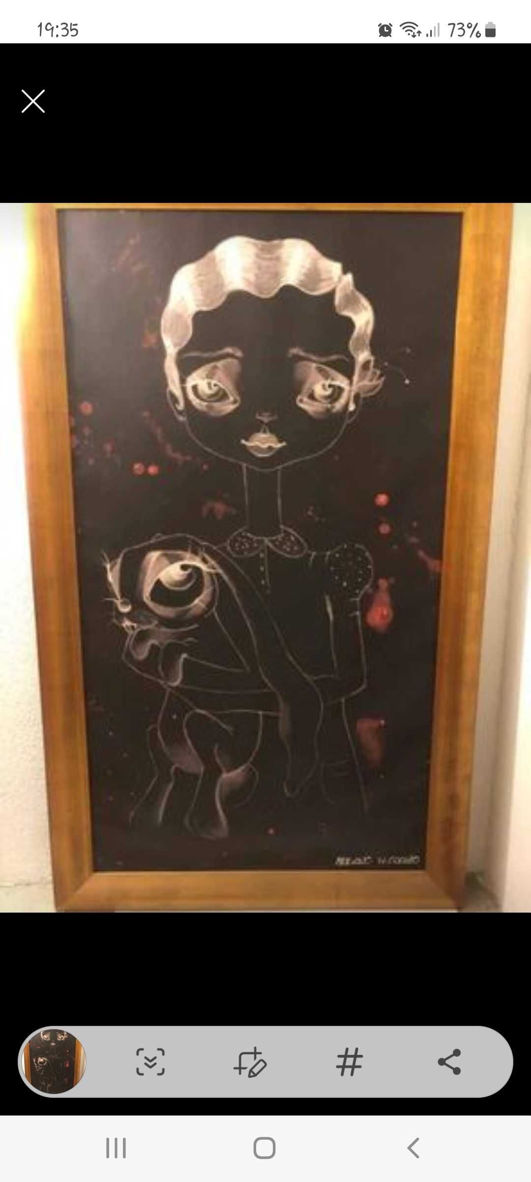 Quadro com modura em dourado