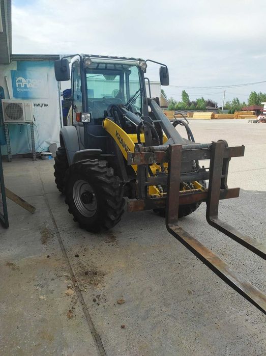 Фронтальний навантажувач KRAMER 5055. Корисний всі чотири сезони.