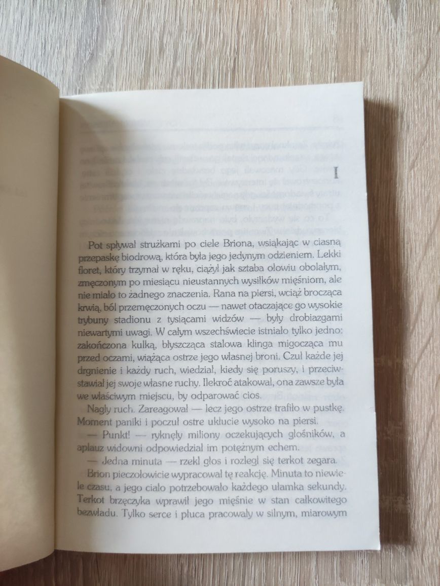 Książka fantasy o sportowcu Planeta przeklętych Harrison