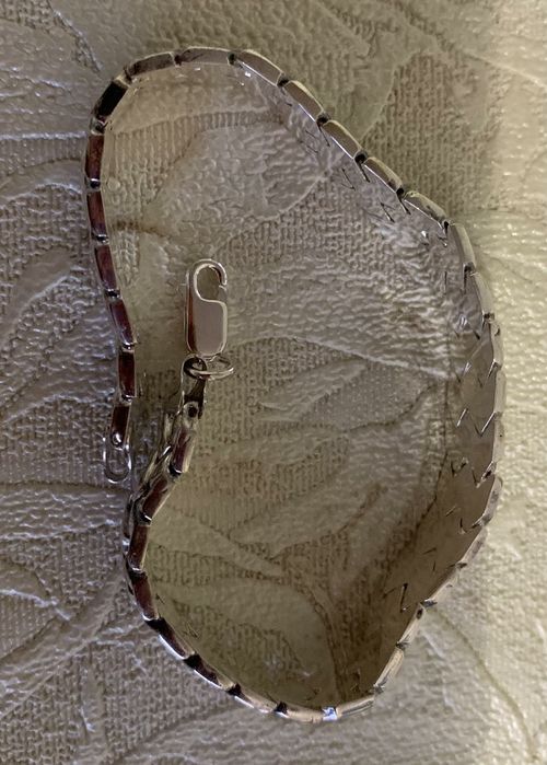 Серебряный браслет .