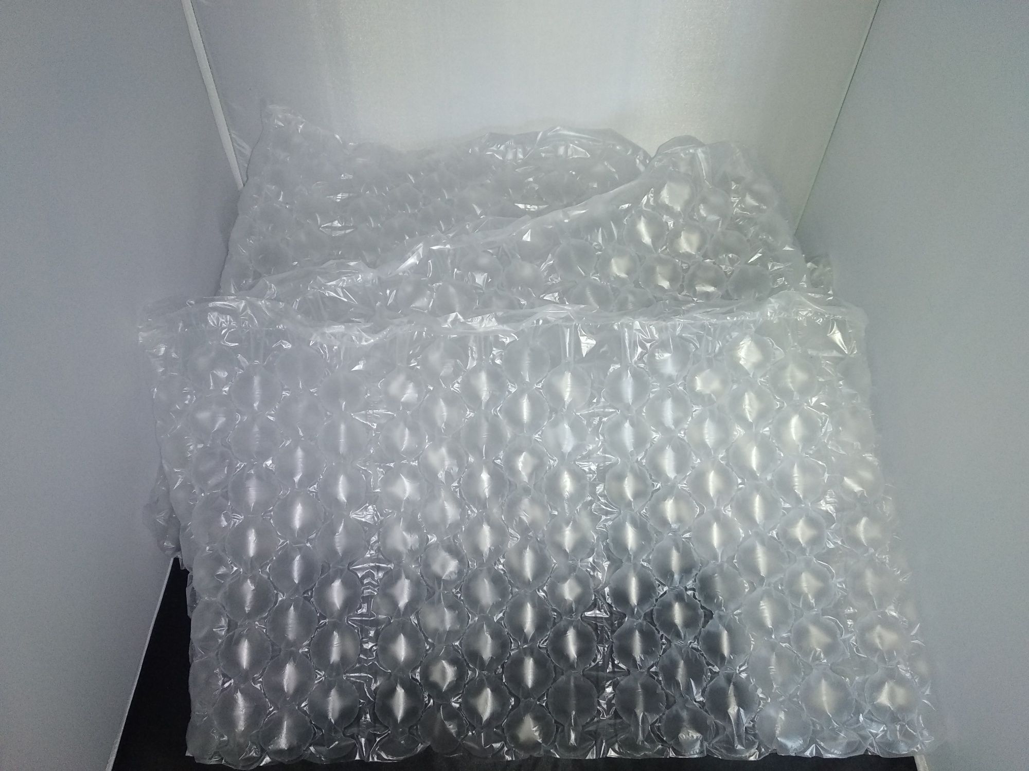 Защитные воздушные подушки (упаковочный наполнитель,надувная упаковка)