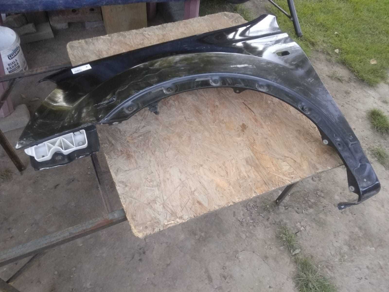 błotnik lewy nissan qashqai z11g