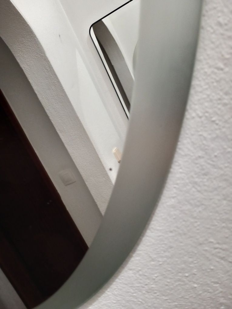 Espelho de casa de banho.