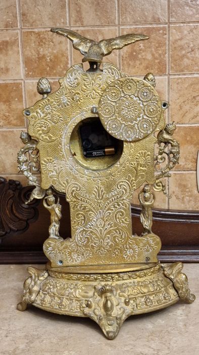 Duży mosiężny zegar z orłem