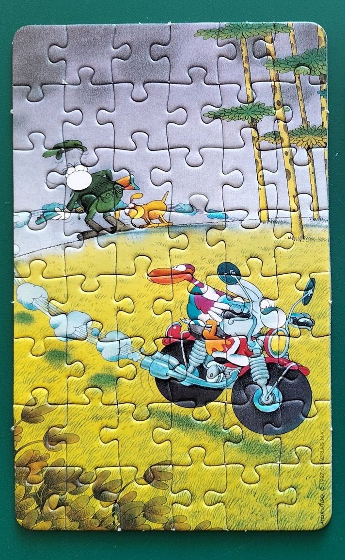 Raro Mini puzzle Heye Mordillo 48 peças