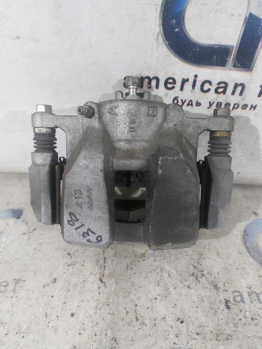 Honda Accord 18- Суппорт тормозной передний / задний