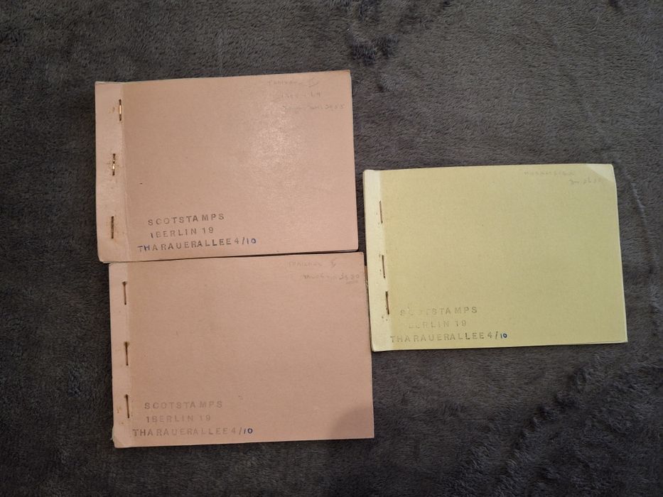 Trzy mini albumy ze znaczkami pocztowymi