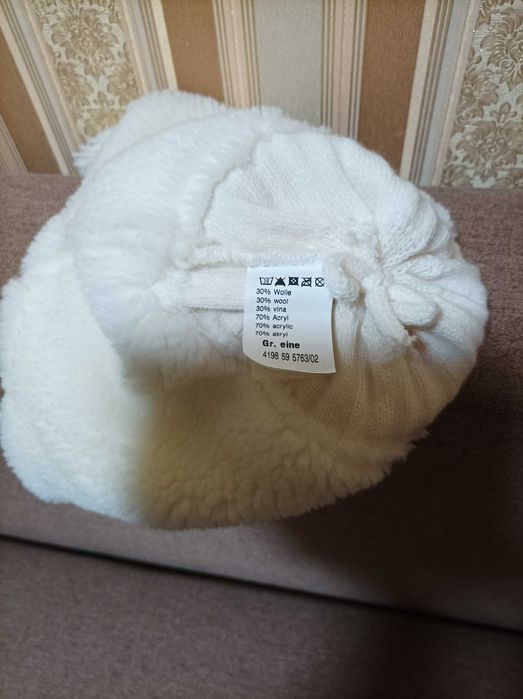 Шапка ушанка вязаная на меху.