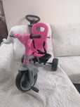 Triciclo rosa com sons
