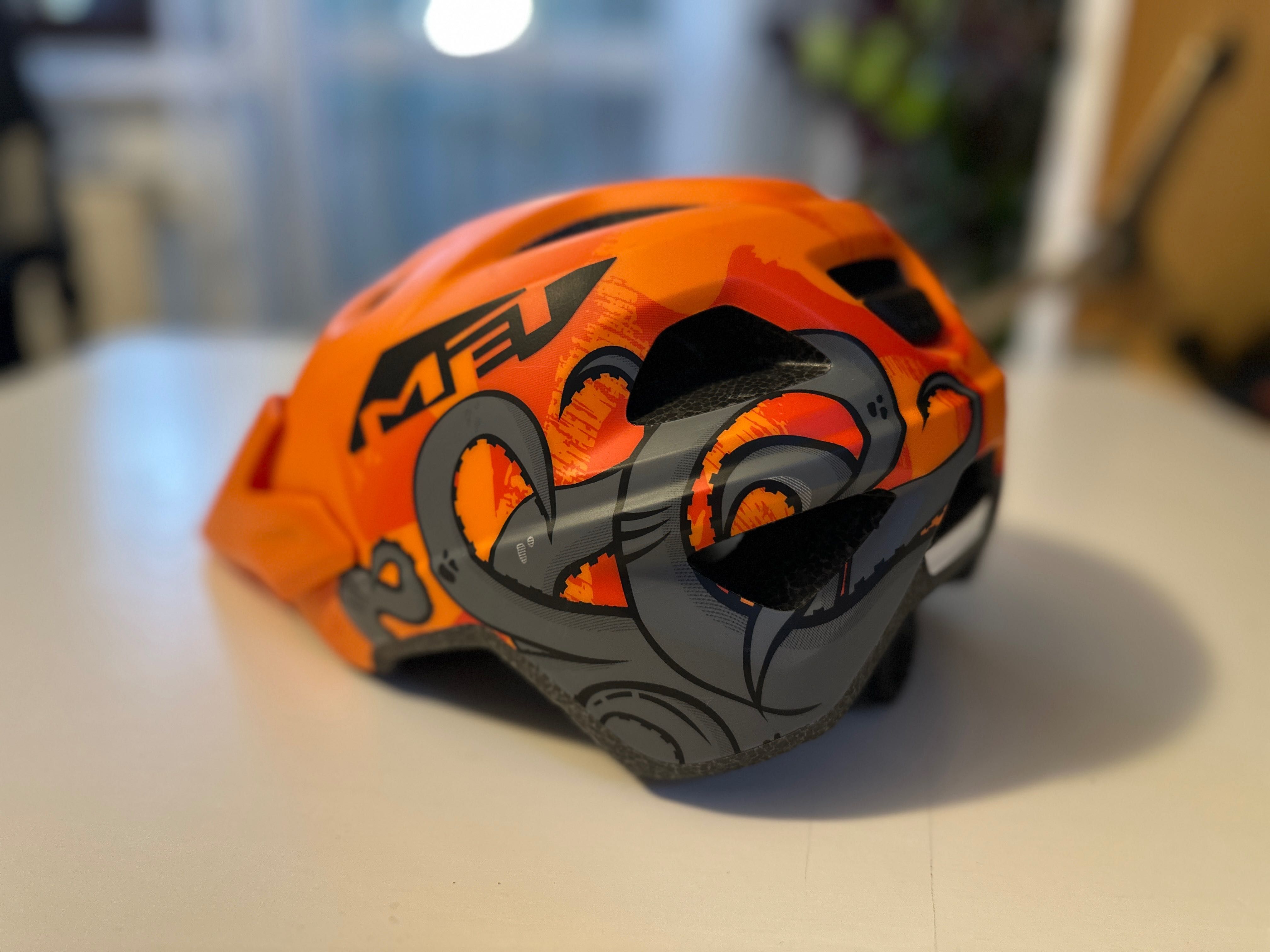 Kask rowerowy - super widoczny „pomarańcz” z ośmiornicą