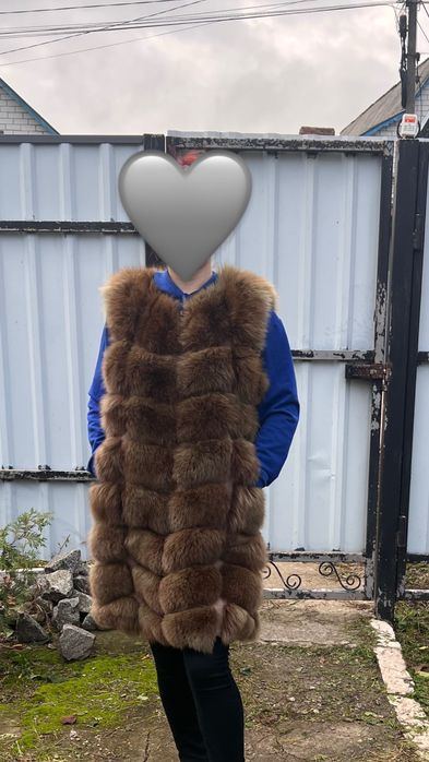Продам меховую жилетку