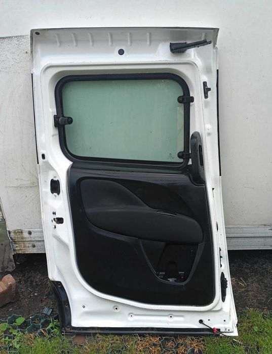 Drzwi lewy tył lewe boczne fiat doblo II lift 2015-
