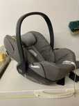 Ovo bebe cybex cinza com redutor