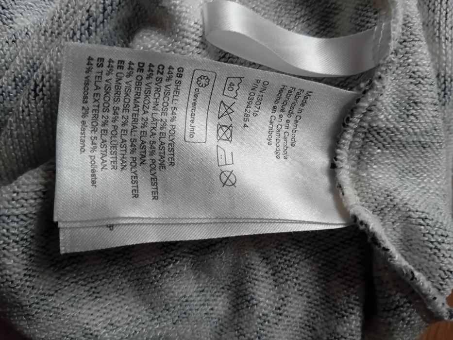 Kardigan H&M 170 narzutka asymetryczna biała we wzroki