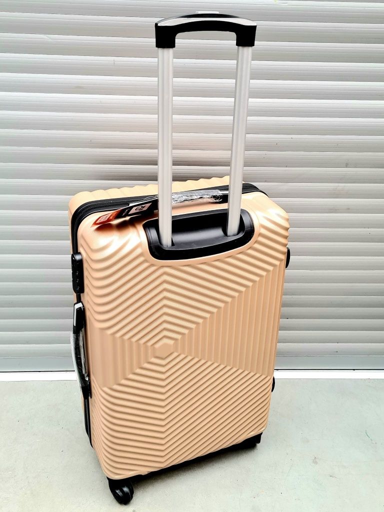 Nowa plastikowa walizka podróżna Cocodivo Large złota