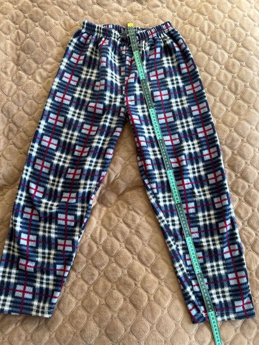 Домашні широкі штани у клітинку