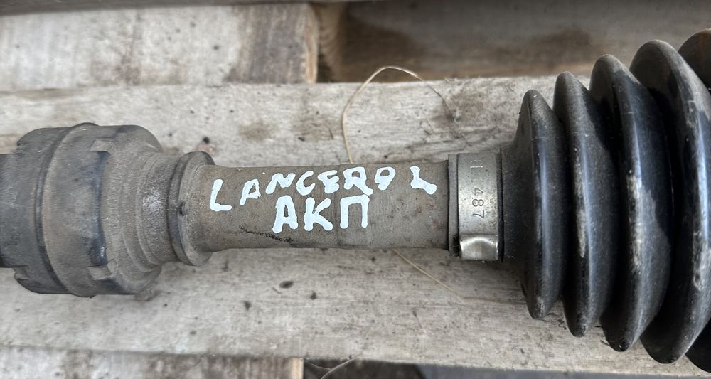 Продам привод левый на Lancer IX 1.6b АКПП 25/25з