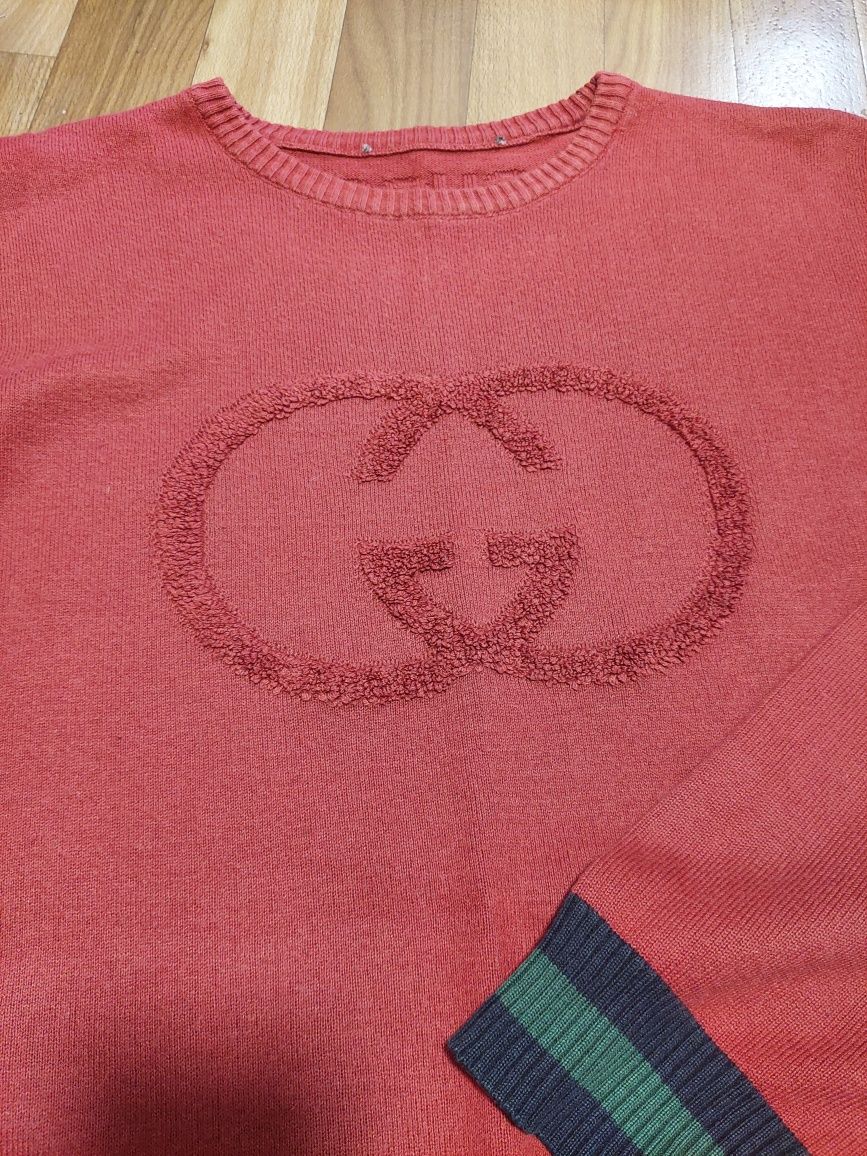 Светри Armani та Gucci