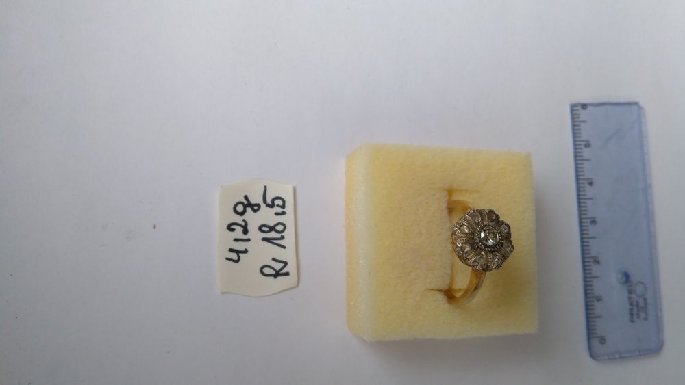 Pierścionek złoty z diamentami w cenie 5000 zł