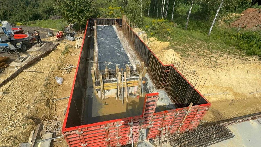 usługi budowlane budowa domów płyta fundamentowa usługi murarskie dom