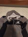 Casaco corta vento new balance